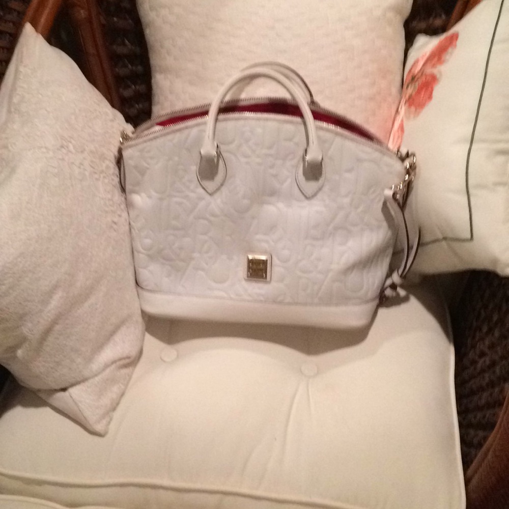 Dooney and Bourk embossed leather domed bag